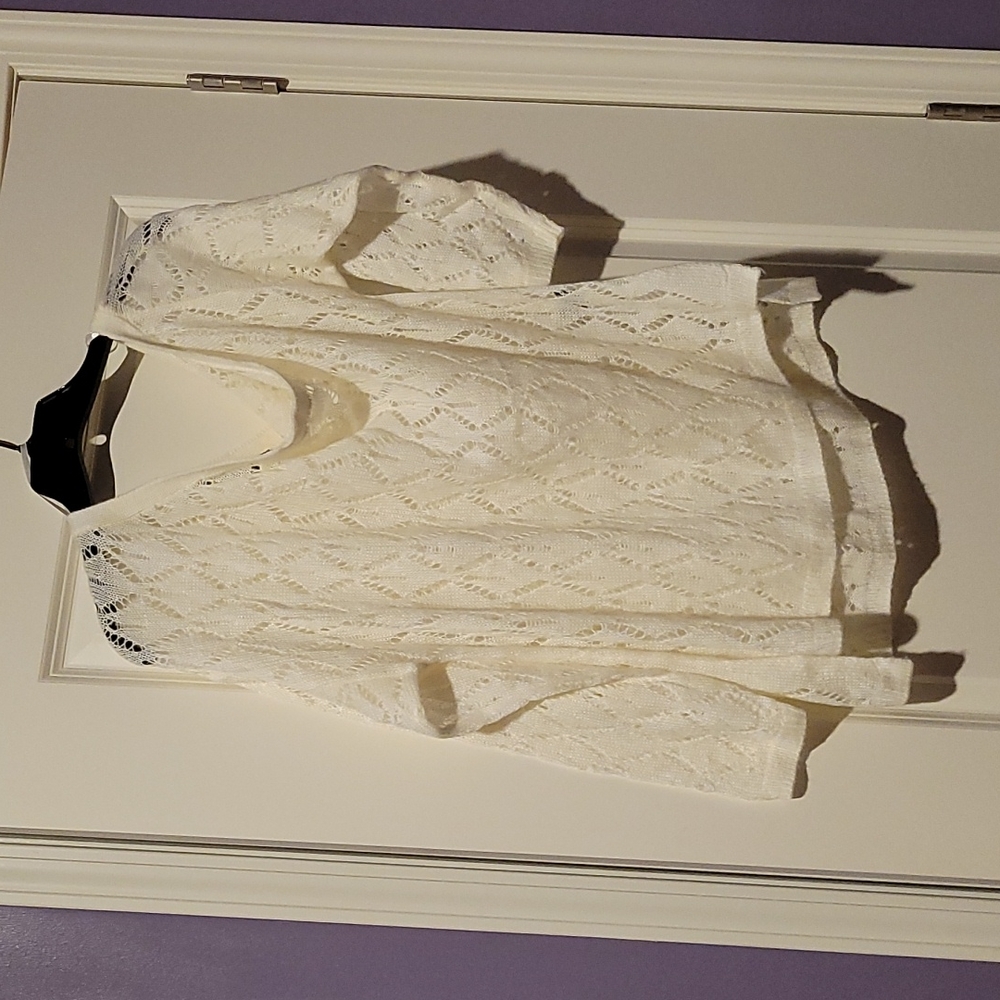 NWOT, Off-white off shoulders long sleeved knitted sweater.